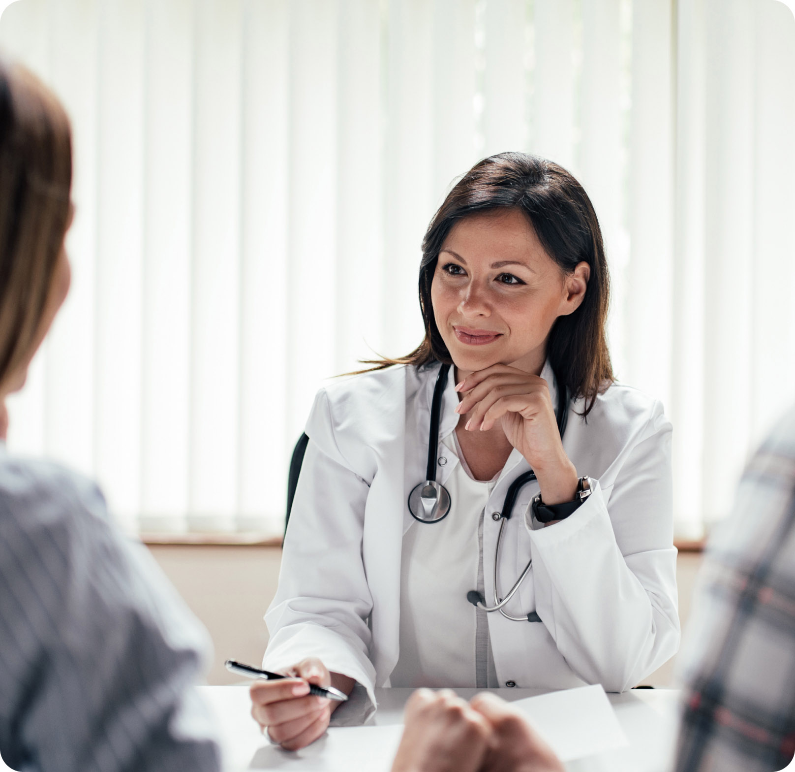 Female Doctor in White Coat